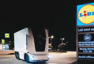 Supermarket chain Lidl and Swedish tech firm Einride deploy Germany’s first driverless electric lorry on public roads to deliver store goods.
